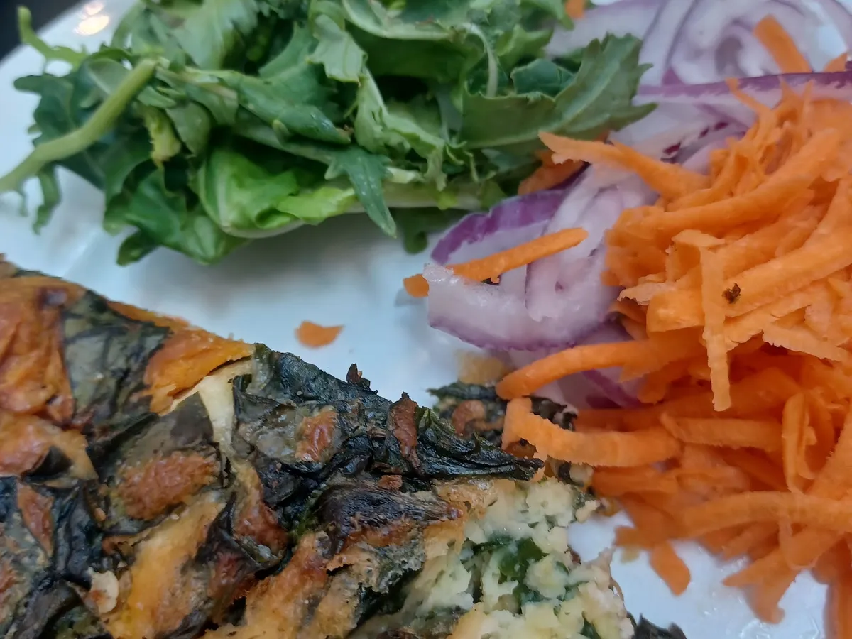 Frittata slice with salad