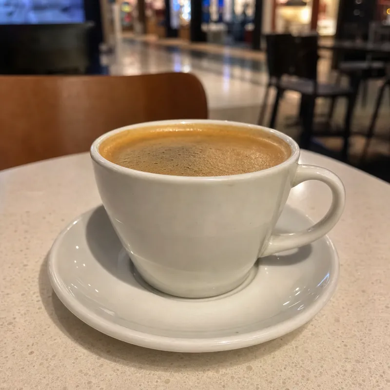 Long black coffee in a cup